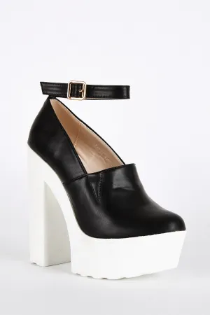 Black Shoe with Cleated Sole and Ankle Strap Detail